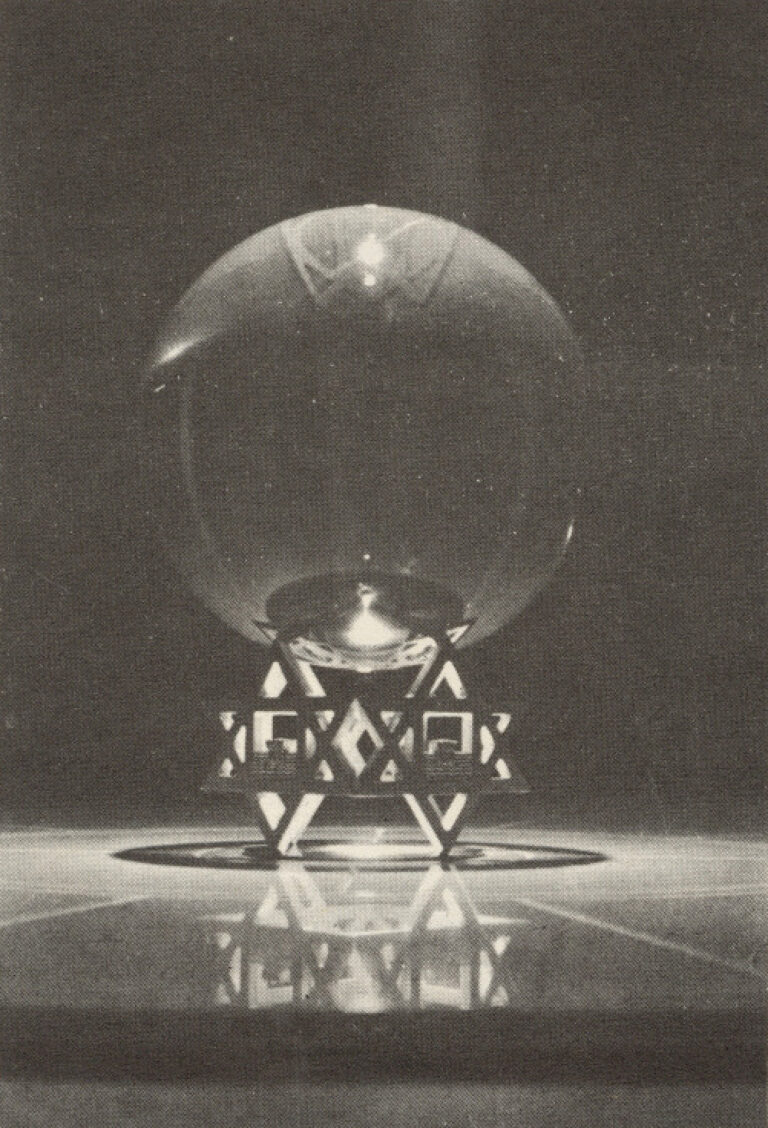 Crystal on on guilded symbol stand